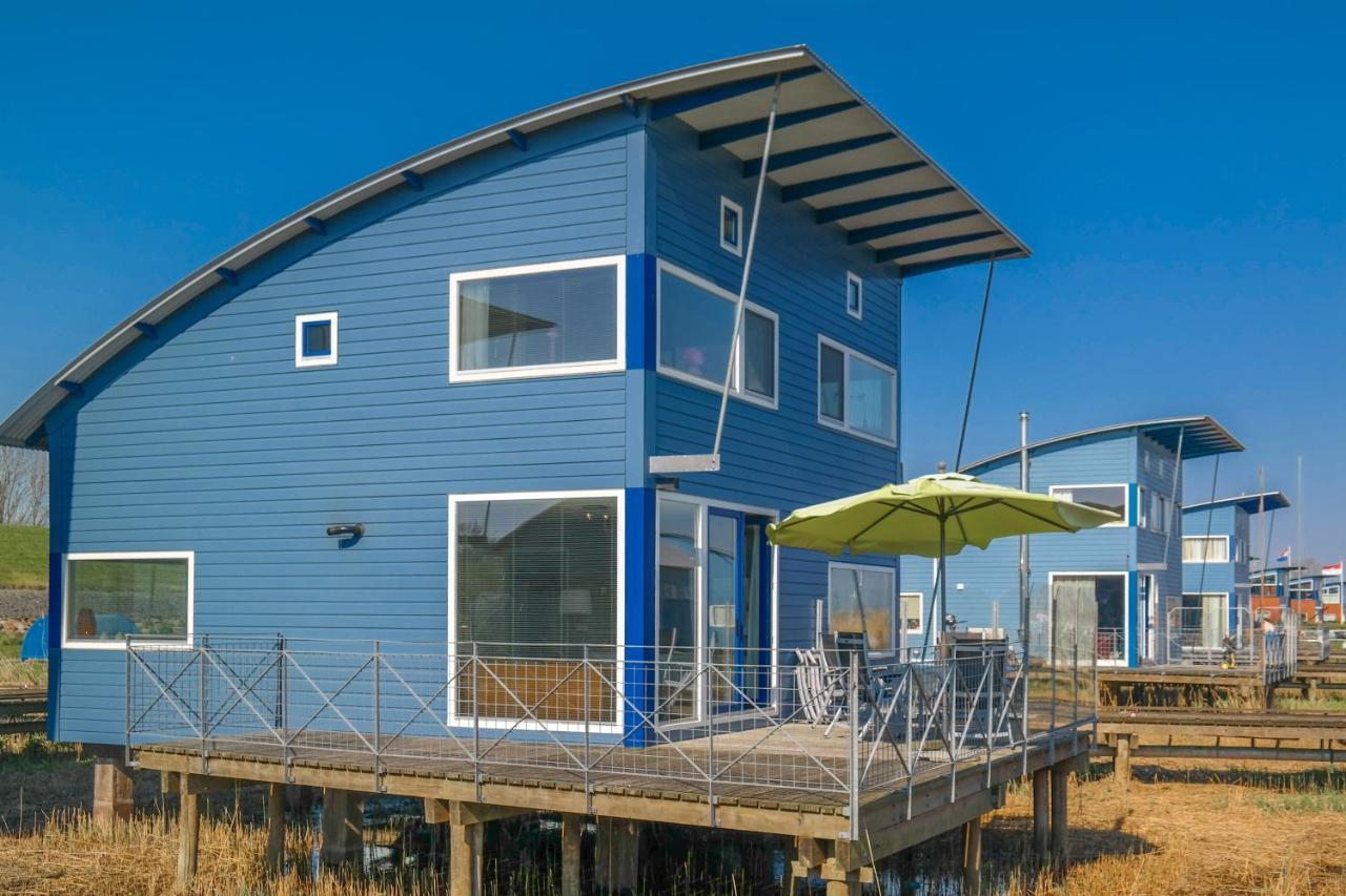 6 Pers. Waterfront Home Seeblick, Equipped Stilt House On The Water Anjum Buitenkant foto